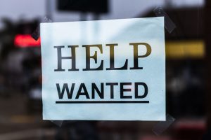 Help Wanted Sign in Window