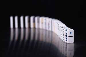 White dominoes on black background