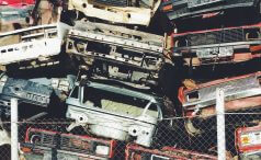 Stacked junkyard cars