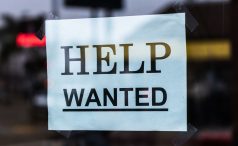 Help Wanted Sign in Window