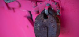 Lock on a pink background