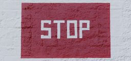 Stop sign painted on a wall