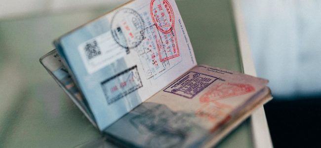 Entry, exit and visa stamps in passport