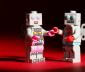 Lego robots holding hands