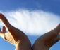 Hands holding a cloud