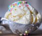 Vanilla ice cream scoop with sprinkles